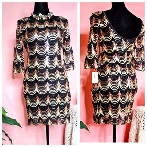 NWT mini beaded stretch dress featuring a deep V-back, in black, Gold
